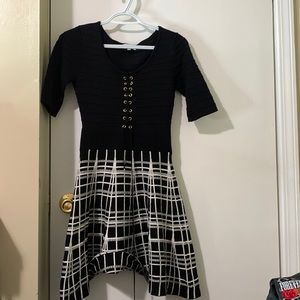 CANDIES: Black and white Midi dress with designs and gold detailing. size: s